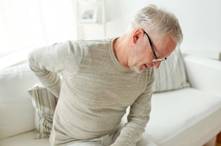 Annular tear causes older man back pain.